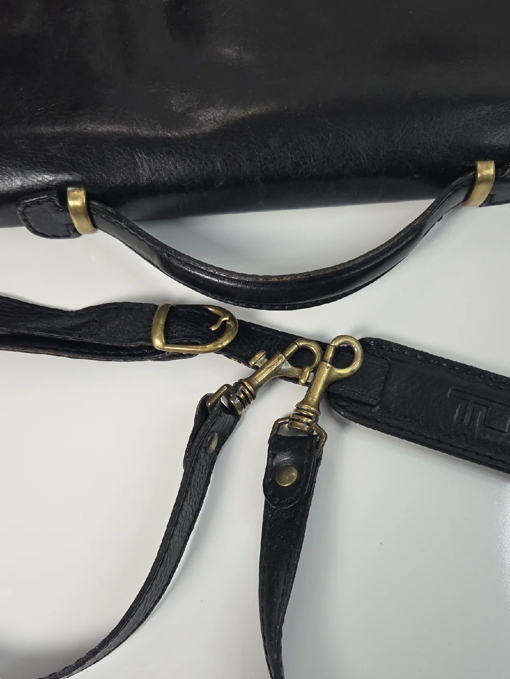 Tumi Full Grain Leather Briefcase Bag in Black With Gold Accent Turnlock